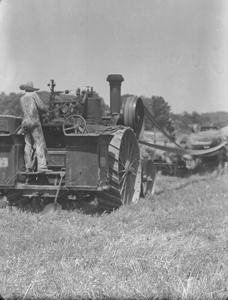 Rear close-up steam engine pulling thresher - Morrells