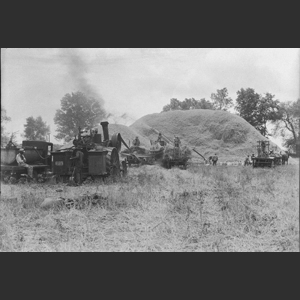 Wheat-threshing - Steam rig - Medium close-ups hands, engine, thresher etc. - "Morrels"