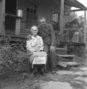 Gene J_ with Grannie J_ at her back steps