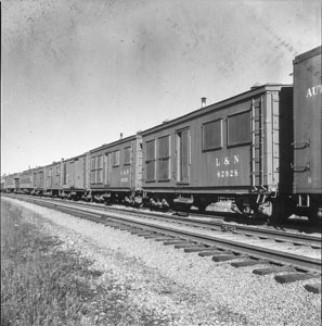 Old track crew living cars off siding at College Grove