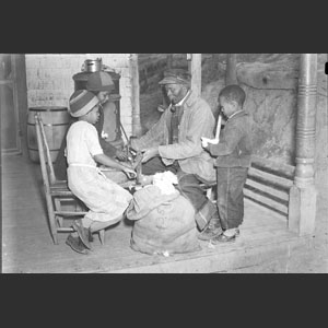 Uncle Jack and his wife working at cotton gin - Mrs. Clark's Mud Tavern