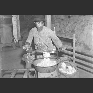 Uncle Jack and his wife working at cotton gin - Mrs. Clark's Mud Tavern